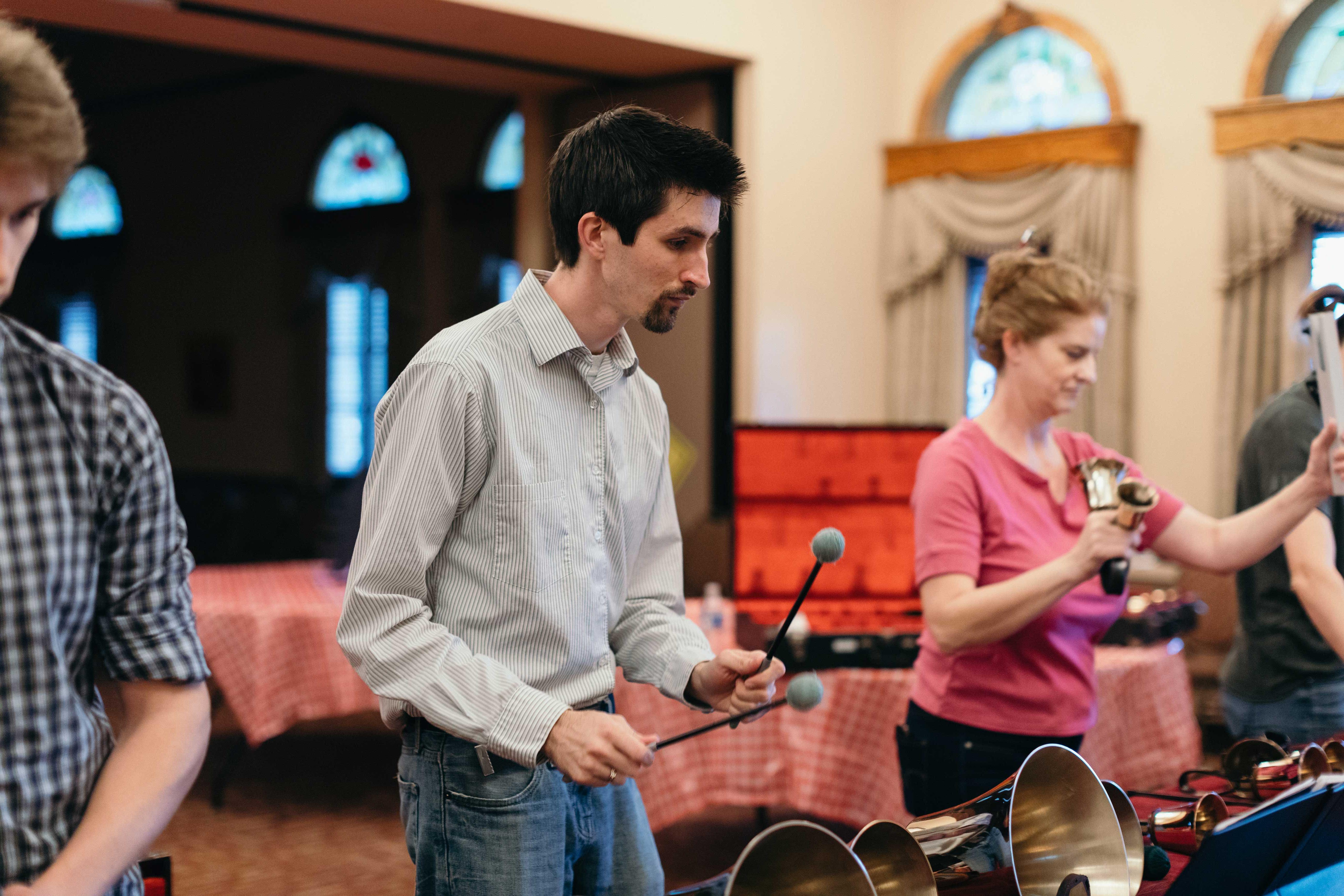 Alex playing handbells